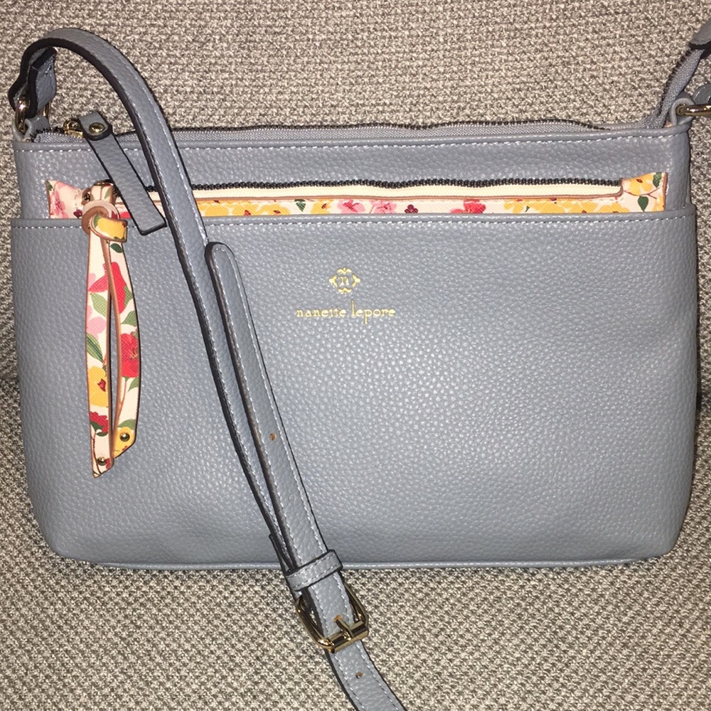 Nanette Lepore Crossbody in light blue with separate flowered organizer